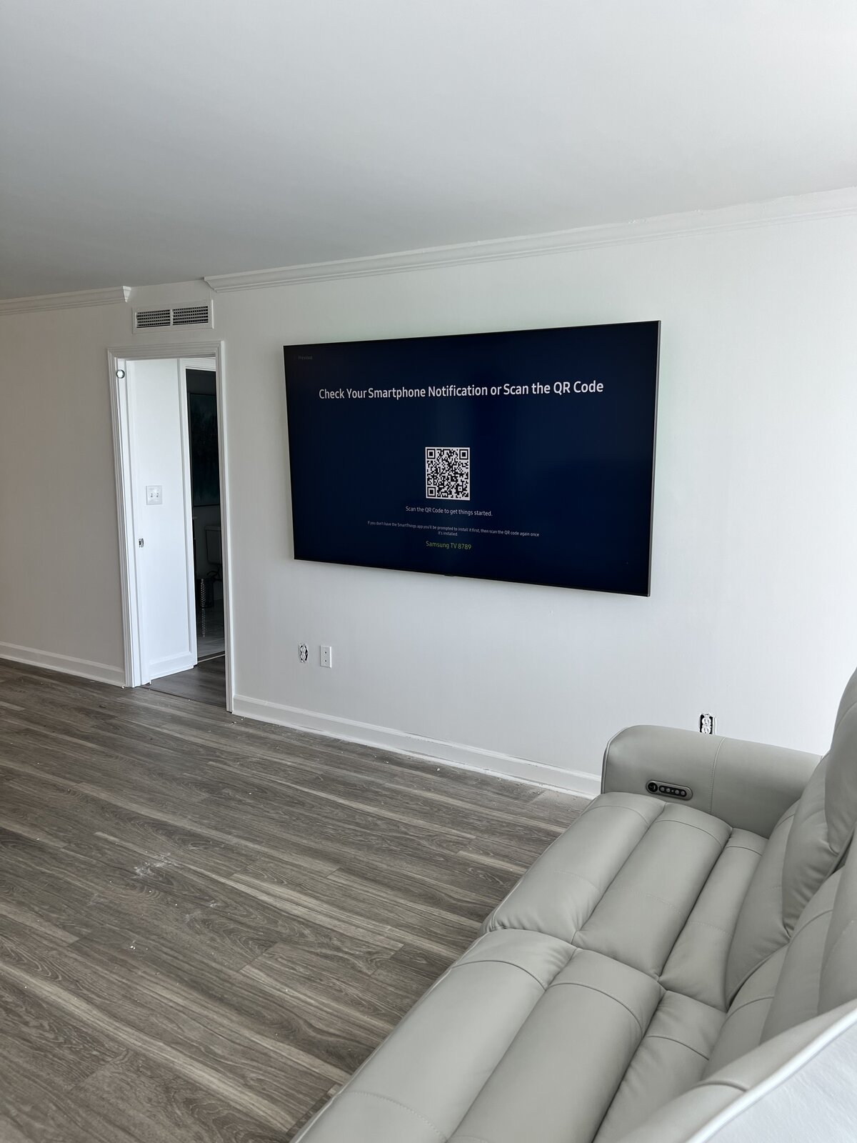 Large Flat Screen Mounted in Living Room