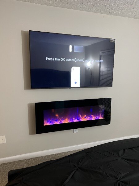 TV Mounted Above Electric Fireplace