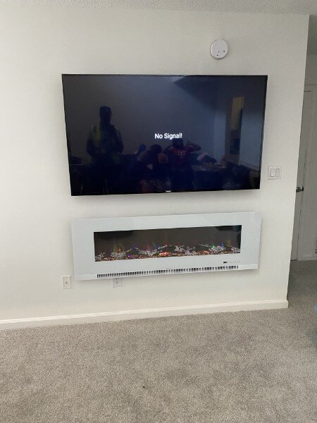TV and White Electric Fireplace Installation